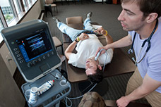 Medical students learn to use ultrasound as a diagnostic tool.